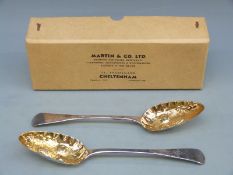 A pair of Georgian hallmarked silver berry spoons with gilt bowls London 1819 maker William Eaton,