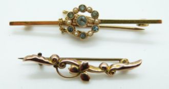 A 15ct gold brooch set with aquamarines and seed pearls (4.6g) and a 9ct gold brooch (1.