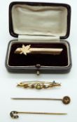 A Victorian stick pin set with a diamond,