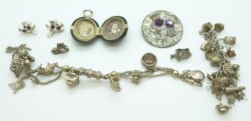 A hallmarked Scottish silver brooch in the form of thistles, Glasgow,