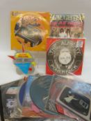 Twenty-three picture/shaped/coloured records including Meat Loaf (3), Jethro Tull, Alice Cooper,