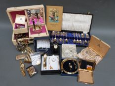 A collection of costume jewellery including watches, brooches, crystal necklace, Ronson lighter,
