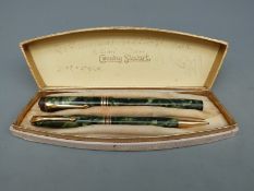 A Conway Stewart boxed pen and propelling pencil set