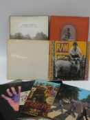 Six Beatles / solo albums and two box sets (All Things Must Pass and For Bangladesh) including a