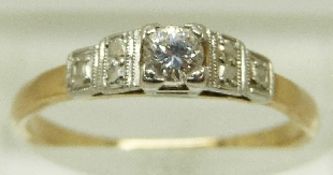 A 9ct gold ring set with diamonds in a platinum setting, size L/M, 1.