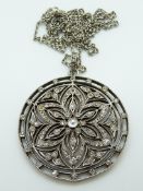 A French silver pendant set with paste and a pearl