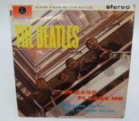 The Beatles - Please Please Me PCS 3042, stereo, black and gold label with Dick James credits.