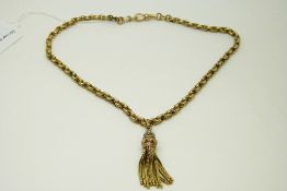 A 15ct gold Victorian Albert of oval links with rope detail and tassel, 22.