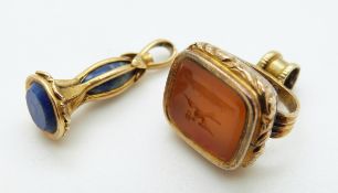 A yellow metal fob set with an agate panel depicting a dove with a letter and a yellow metal fob