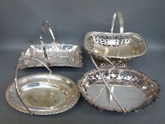 Four silver plated swing handled serving dishes or baskets