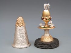 Hallmarked silver and silver gilt novelty surprise Easter mushroom opening to reveal a leprechaun