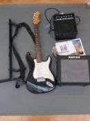 Encore electric lead guitar in black and ivory coloured finish together with a guitar stand,