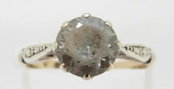 A 9ct gold ring set with a paste solitaire in a platinum setting, size J, 2.