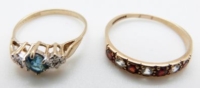 A 9ct gold ring set with a topaz and diamonds and a 9ct gold ring set with garnets and paste,