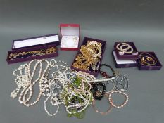 A collection of jewellery including pearl necklaces, peridot necklace, smoky quartz necklace,