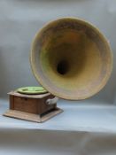 Early 20thC wind up table top gramophone in oak case with 'Percy J Grainger Music Warehouse,