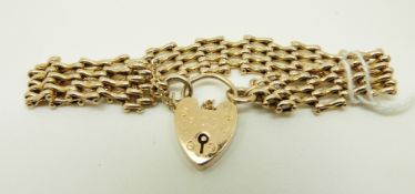 A 9ct gold gate bracelet with heart padlock clasp,
