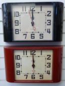 Two Newgate quartz 'Metro' clocks in Deco style case, one in red the other black,