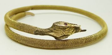 A 9ct Victorian gold snake bracelet/ bangle set with red paste eyes, 14.