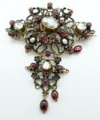 Austro-Hungarian silver gilt brooch/ pendant set with garnet cabochons,