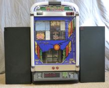 The Wizard NSM c1980s CD juke box with light up surround to the arch front, 100cm tall, 60cm wide,