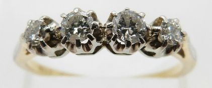 An 18ct gold ring set with four round cut diamonds in a platinum setting, size M, 2.