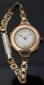 9ct gold ladies wristwatch with blued hands, Arabic numerals,