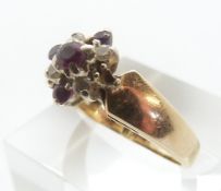 A 9ct gold ring set with rubies and diamonds, size M/N, 3.