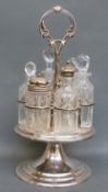 A silver plated six bottle cruet with cut glass bottles,