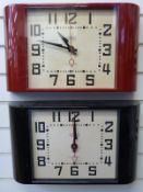 Two Newgate quartz 'Metro' clocks in Deco style case, one in red the other black,