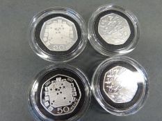 Four silver proof piedfort fifty pence coins comprising two 1993 UK / EU examples and two D Day