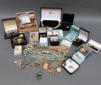 A collection of costume jewellery including a Sarah Coventry brooch, faux pearls including Lotus,