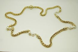 An 18ct gold necklace of plaited sections interspersed with cultured pearls,