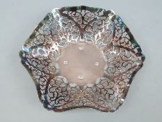 A hallmarked silver pierced bon bon dish with feature hallmarks, Sheffield 1975, width 14.
