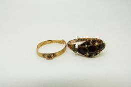 A 9ct gold Victorian ring set with garnets and seed pearls Chester 1890 and an 18ct gold ring,