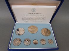 A cased solid silver coin set the Coinage of Belize