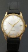 Avia 9ct gold gentleman's wristwatch with date aperture, gold hands and baton markers,