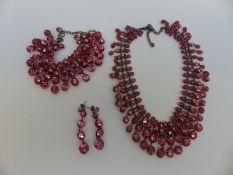 A suite of Butler & Wilson jewellery made up of faceted pink beads comprising earrings,