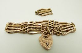 A 9ct gold gate bracelet with engraved foliate design, 11.