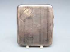A hallmarked silver cigarette case with engine turned decoration SIZE/WEIGHT??