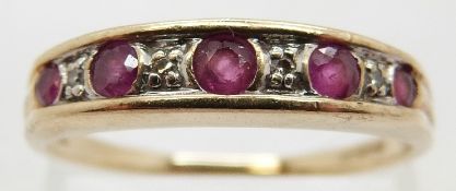 A 9ct gold ring set with alternating diamonds and rubies, size P/S, 2.