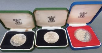 Two Royal Mint National Trust silver commemorative coin /tokens hallmarked to the edges,