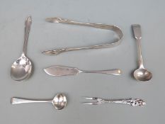 A quantity of Georgian and later hallmarked silver cutlery including sugar tongs