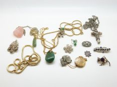 A collection of jewellery to include filigree brooch, rose quartz pendant, chains,
