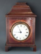 A 19thC mantel clock with single train movement, Roman dial enamelled with red Arabic minutes,