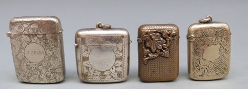 Four silver plated vestas