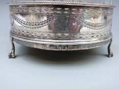 Georgian hallmarked silver five bottle cruet with pierced and bright cut decoration,