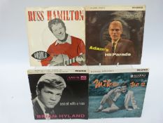 Over 150 singles and EPs mostly from the late 50s and early 60s,