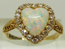 A Victorian 18ct gold ring with pierced shoulders,