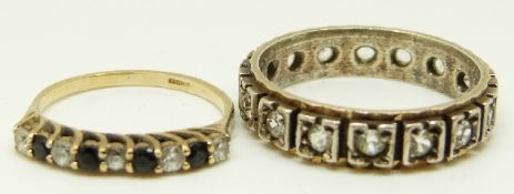 A 9ct gold ring set with sapphires and cubic zirconia (1g) and a a silver ring